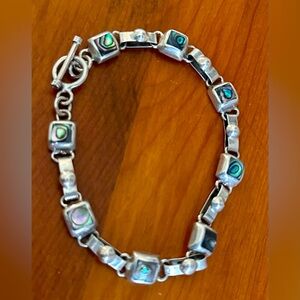 Silver bracelet with multicolor accent stones